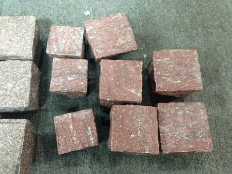 Red porphyry cube stone